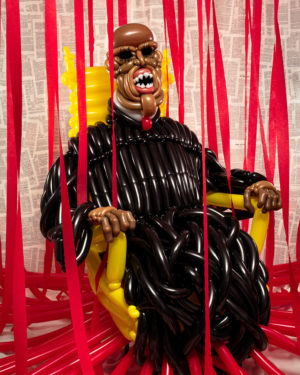 Clarence Thomas balloon sculpture sitting on a golden throne in front of a bible wall backdrop with blood red party streamers hanging down around him in the style of Francis Bacon's Study after Velázquez's Portrait of Pope Innocent X