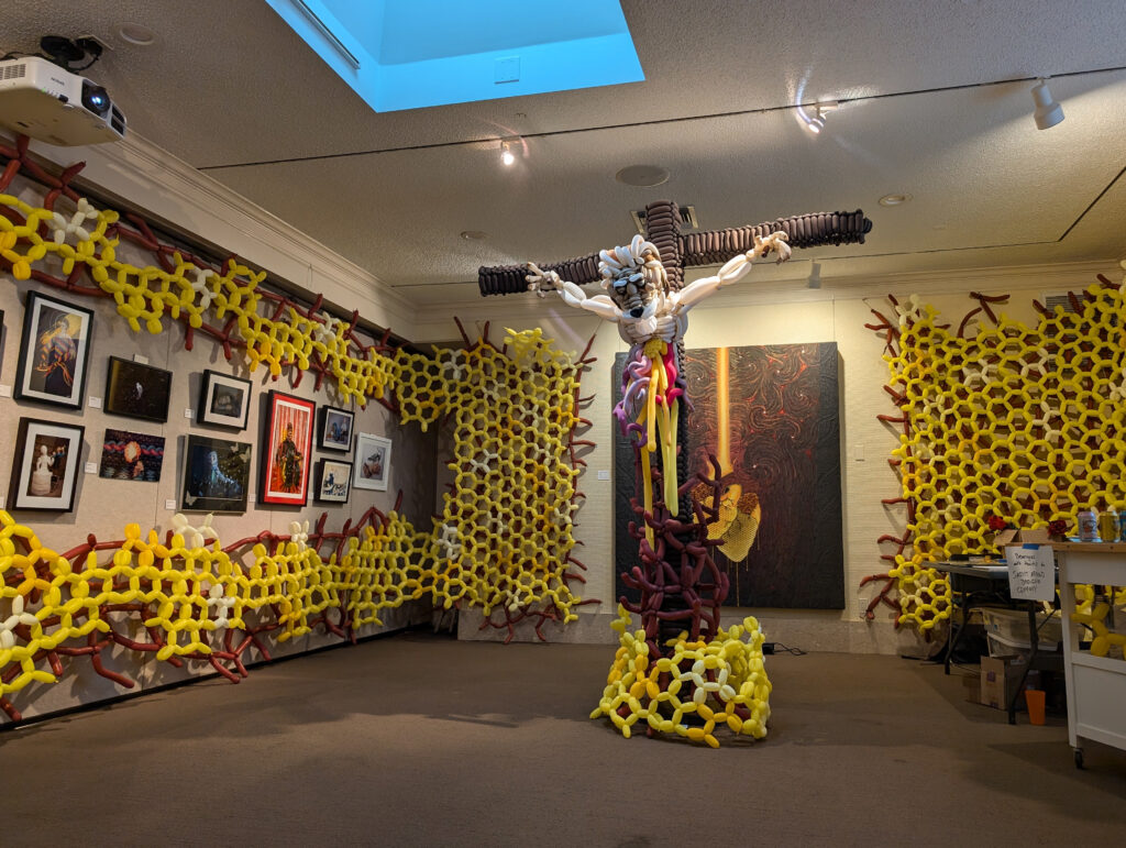 balloon exhibit with walls covered in honeycomb